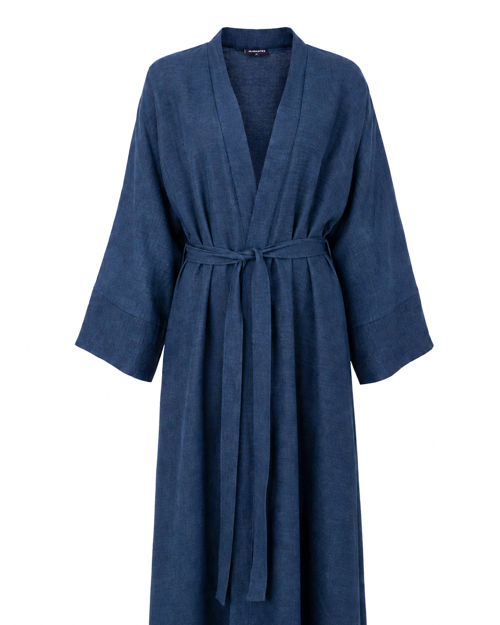 Model wearing the Bahr blue linen jacket over the matching Bahr abaya with a cream hijab