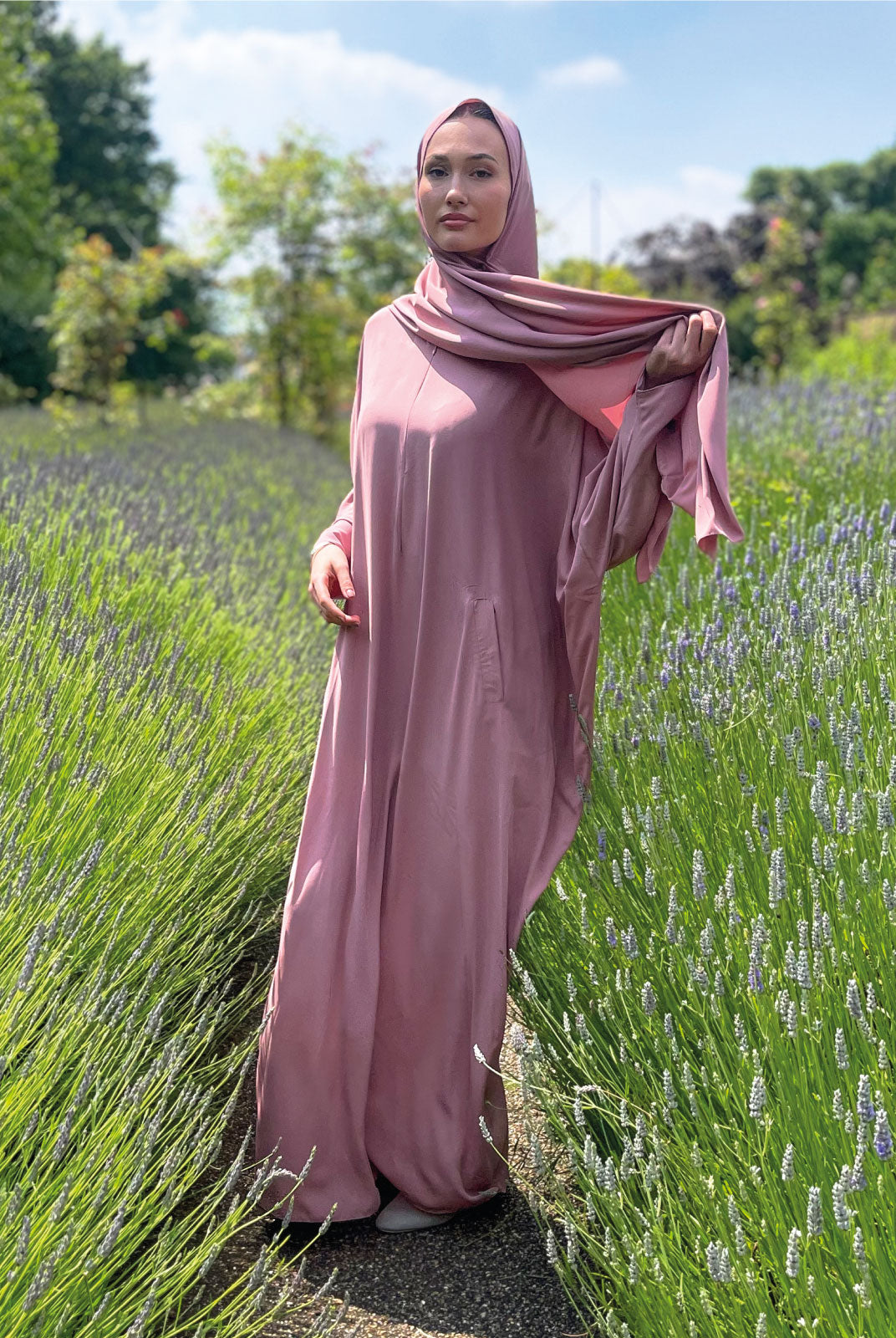 Pink Kaftan Summer maxi modest dress with pink madina crepe hijab at a lavender field on a sunny da
