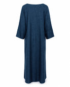 Model wearing the Bahr blue linen abaya with a cream hijab, full length modest abaya