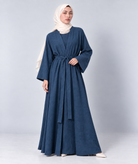 Wide bell sleeve detail on the Bahr blue linen open abaya jacket