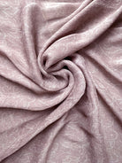 Close-up of pink fabric with folds