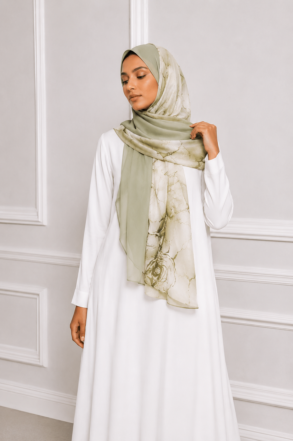 Model wearing sage floral chiffon hijab with modest outfit