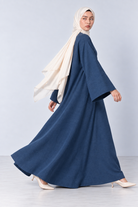 Wide bell sleeve detail on the Bahr blue linen lycra abaya