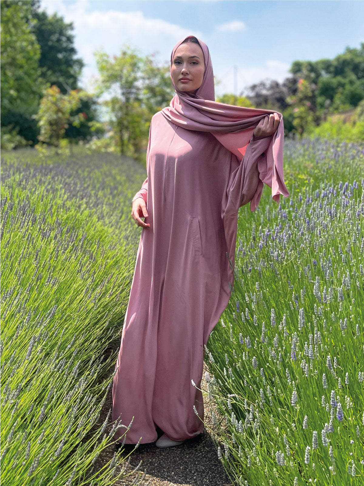 Pink Kaftan Summer maxi modest dress with pink madina crepe hijab at a lavender field on a sunny da