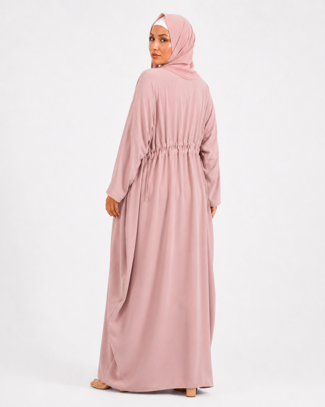 Soft pink modest kaftan with front zip and flowing sleeves