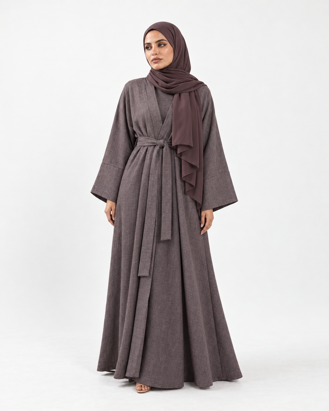 Qahwa coffee brown linen lycra open abaya jacket with tie waist, worn over the matching abaya