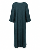 Model wearing the Fayrouz teal linen abaya under the matching Fayrouz jacket