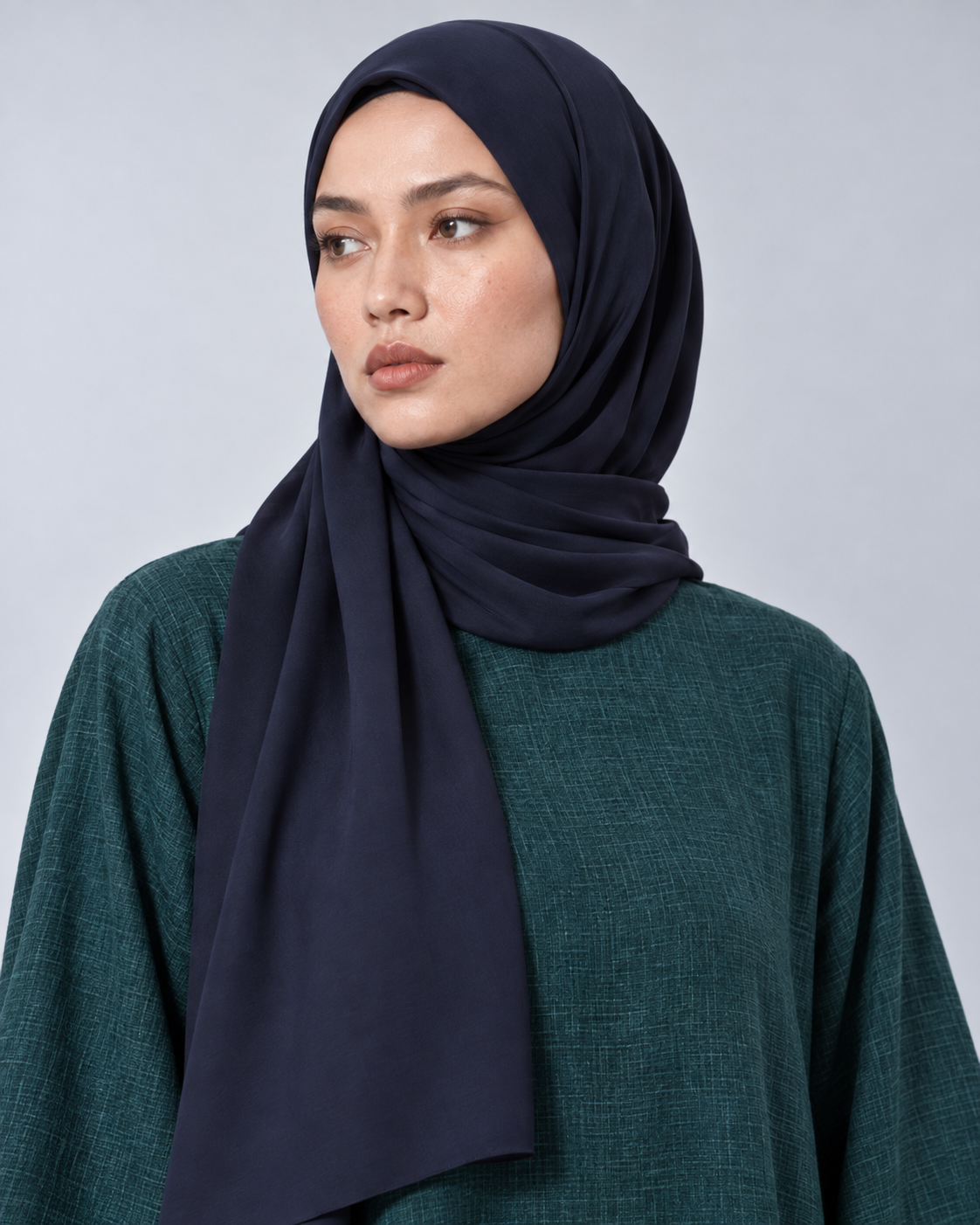 Full length view of the Fayrouz teal abaya showing the straight relaxed cut