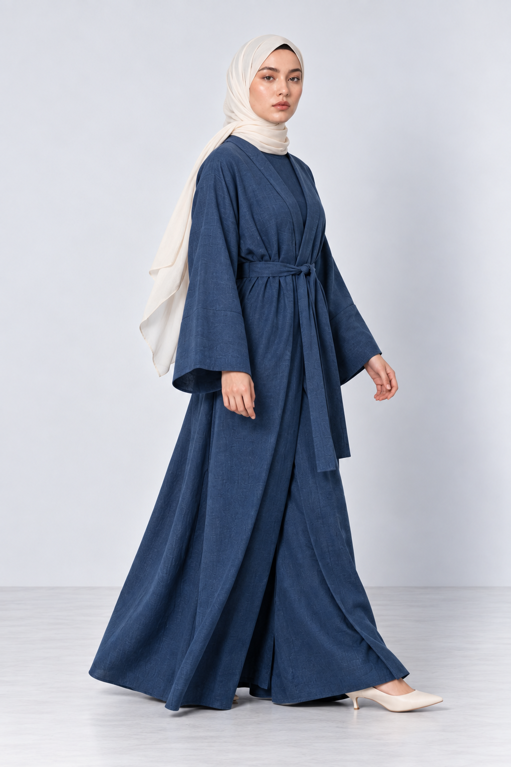 Self-tie fabric belt detail on the Bahr blue linen lycra jacket